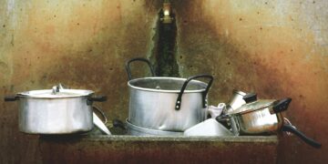 kitchen utensils on stone washing station
