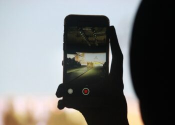 person using smartphone camera