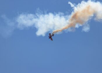 a plane flying through the air