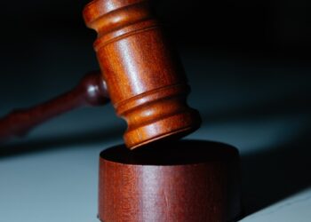 a wooden gaven sitting on top of a white counter
