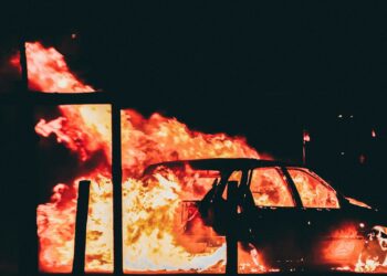 burning vehicle at night time