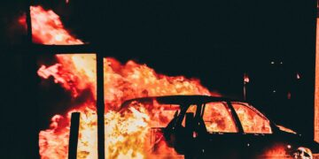 burning vehicle at night time